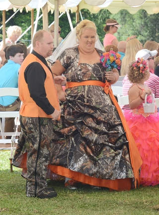 Illustration for article titled The Search for the Ugliest Wedding Dress Ever Created